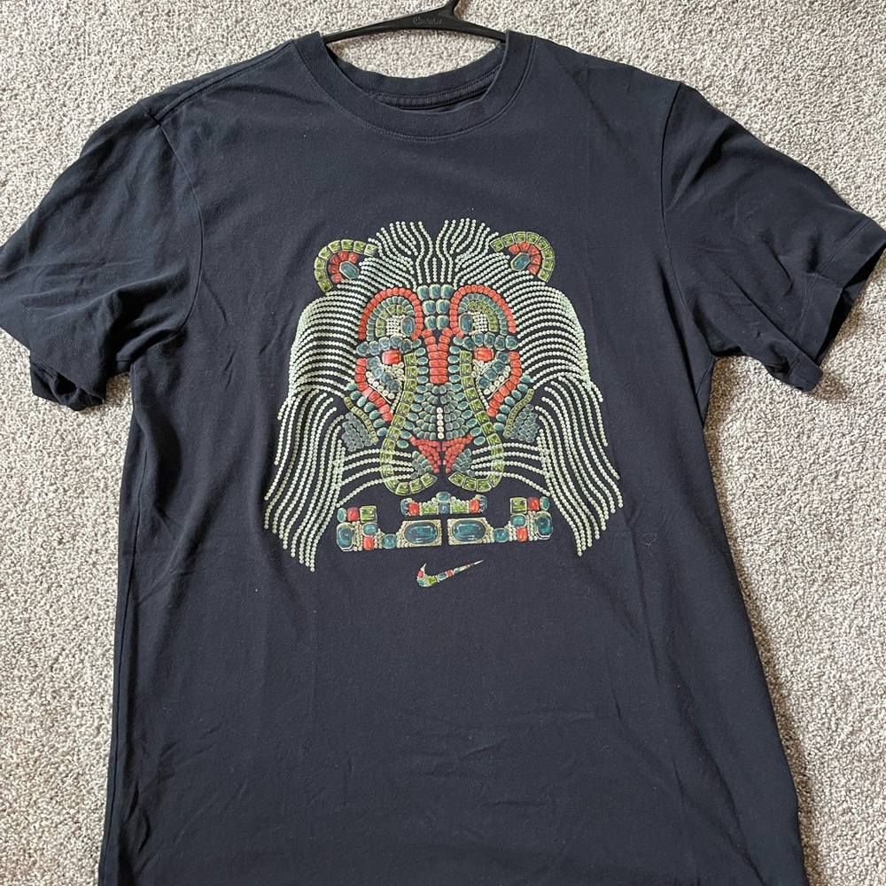 Nike Men's Black Tee with Colorful Lion Design